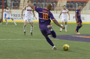 Defender Marco Chantel clears the ball in the Harrisburg Heat's home opener against the MASL defending champions Baltimore Blast.